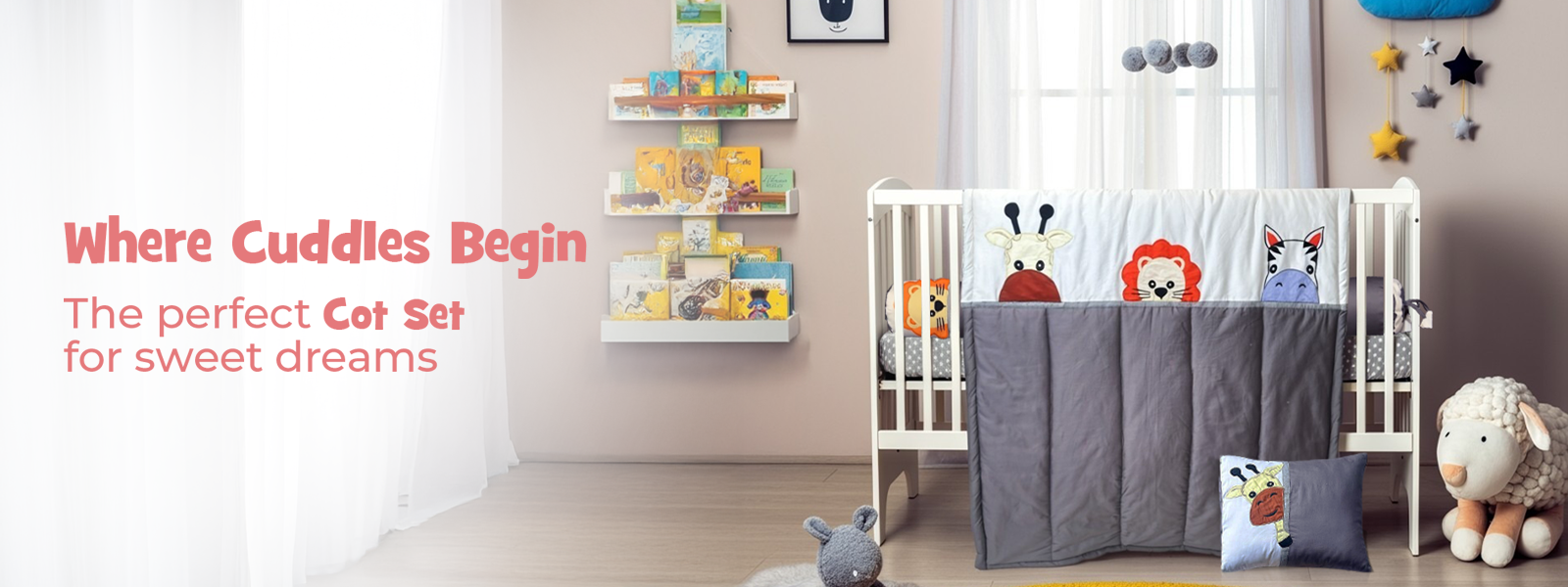 Children's crib with gray and multicolor bedding set, surrounded by toys and books in a nursery.